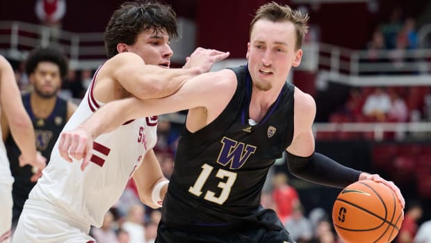 Moses Woods drives to the basket against Stanford.